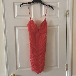 Coral Mini dress with ruching. Never worn. Tags intact. Smoke-free home.